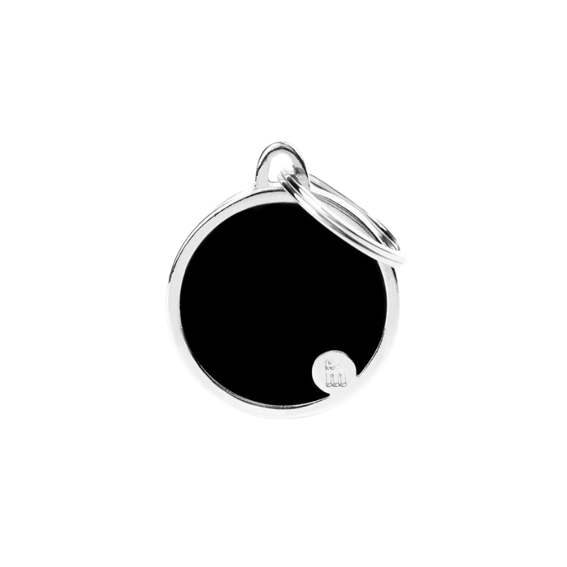 Médaille en forme de cercle noir avec contour argenté